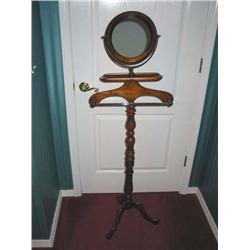 Silent Valet in fruitwood w/a turned column & oval mirror & a brass hanging bar 18" x 56.5" - mirror