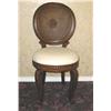 Image 1 : Round-backed desk chair w/double cain & a center medallion in carved fruitwood upholstered in cream 