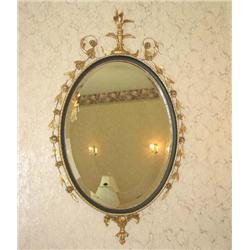 Copy of an oval Adam mirror w/Gesso scroll work, flowers, & leaves  & a plummed crest - 51" x 31"