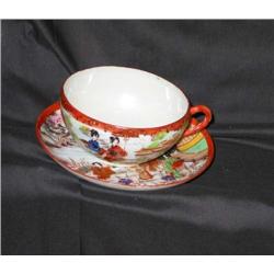 Japanese porcelain eggshell cup & saucer in handpainted court scenes multi colored