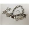 Image 1 : Sterling silver bracelet, charms, brooch