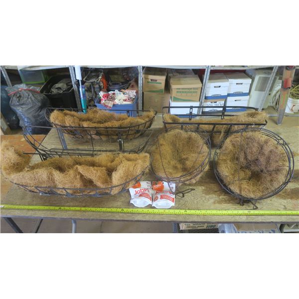 lot of planters and tomato fertilizer spikes