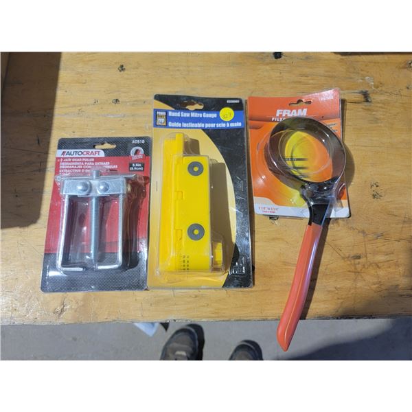 2 jaw gear puller, hand saw mitre gauge, oil wrench (brand new)