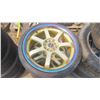 Image 2 : set of 4 Gold Oil Slick rims and tires - 5 bolt universal - Falken 215/35ZR18 low profile