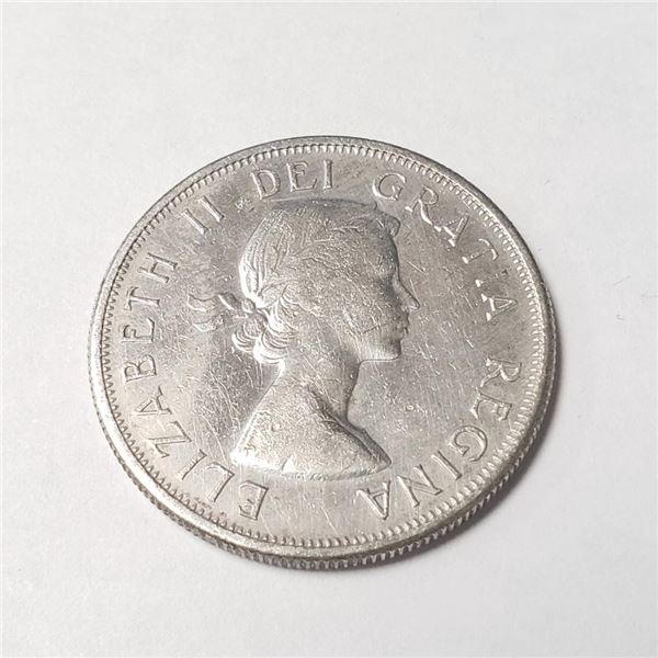Silver Canadian 50 Cents Coin (~Size 0) (~length 0 inches), Suggested Retail Value $160