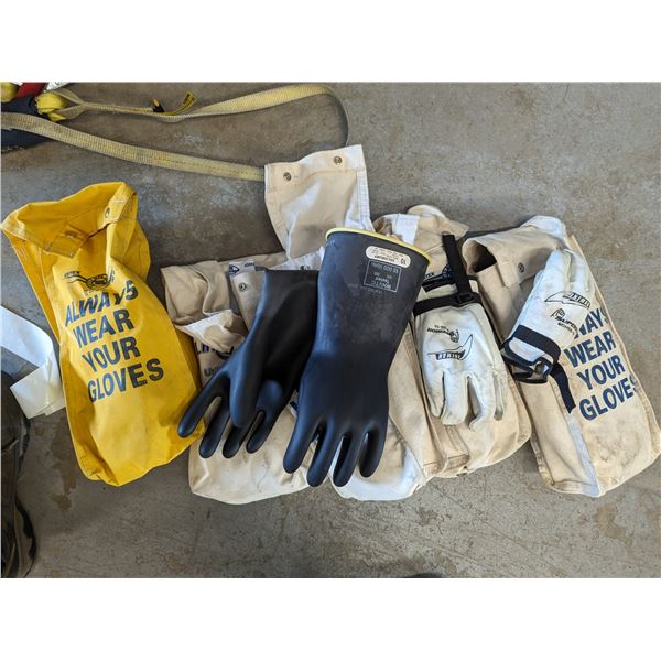 5 BAGS WITH LINESPERSON GLOVES. GLOVES WITHSTAND UP TO 10,000 VOLTS