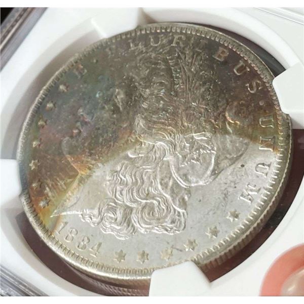 Monster Rainbow 1884-O Morgan Silver Dollar NGC MS64