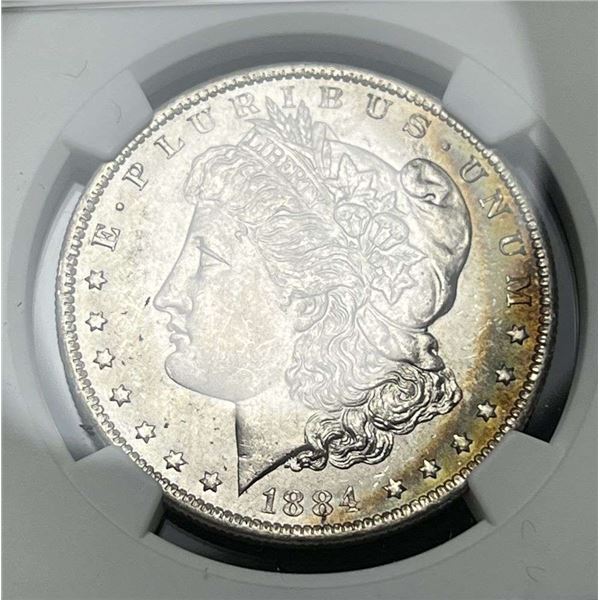 Monster Rainbow 1884-O Morgan Silver Dollar NGC MS64