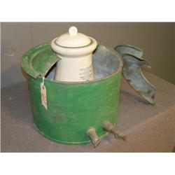 20TH CENTURY STONEWARE COOLER IN TOLE CONTAINER