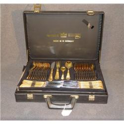 CASED SET OF GOLD PLATED FLATWARE