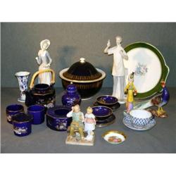 SHELF LOT INCL BLUE CHINA, ROCKWELL FIGURINE, CLOW