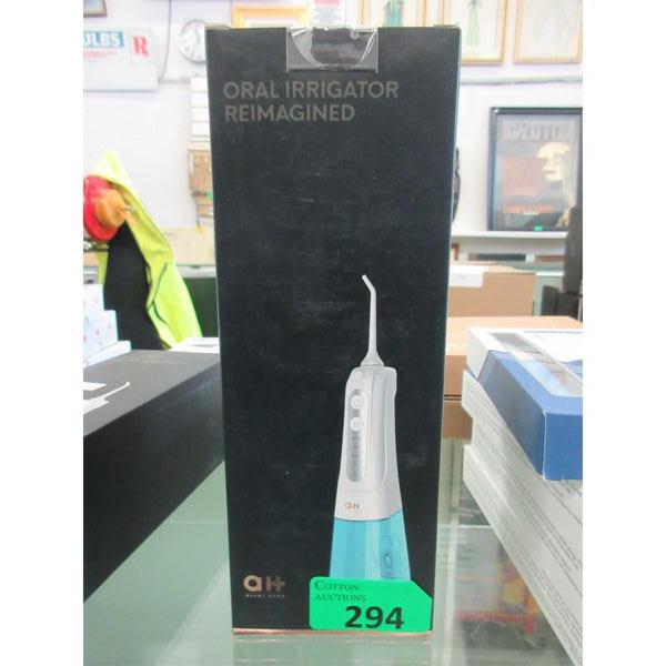 New Compact Hand Held Oral Irrigator