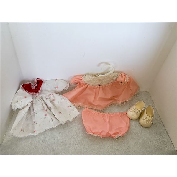 SMALL LOT OF CABBAGE DOLL CLOTHING ON OFFICIAL HANGER