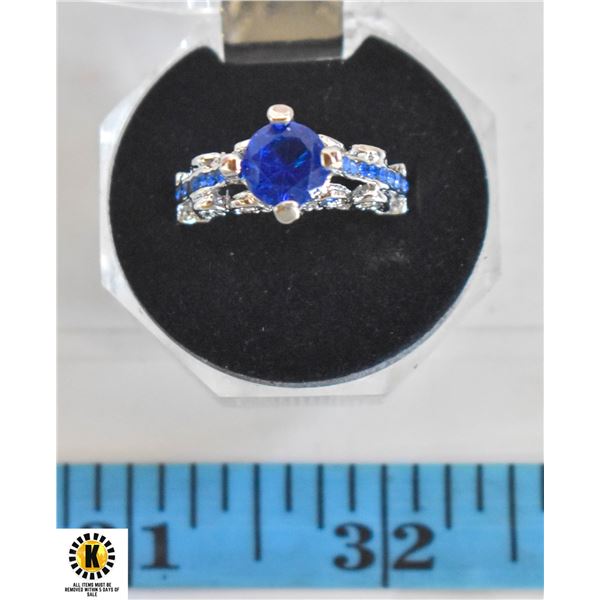 SAPPHIRE COLORED CENTER W/BLUE CHANNEL SET