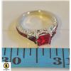 Image 1 : LADIES RING WITH RUBY COLORED STONES