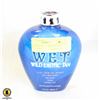 Image 1 : BOTTLE OF W.E.T. WILD EXOTIC TAN LOTION