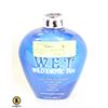 Image 1 : BOTTLE OF W.E.T. WILD EXOTIC TAN LOTION