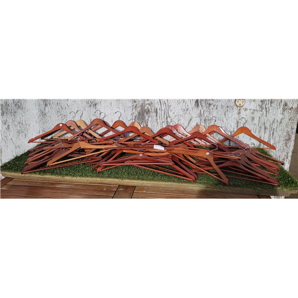 Large Assortment Of Wooden Hangers