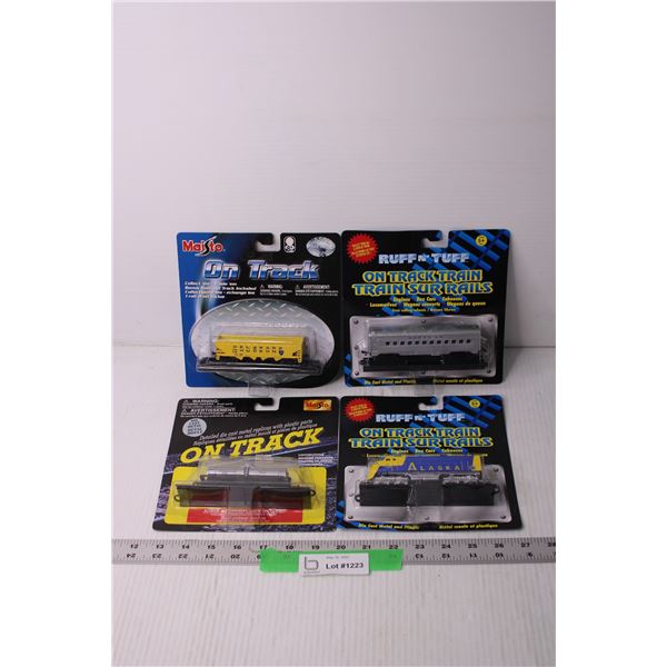 (4) Die Cast Train Cars (NIB)