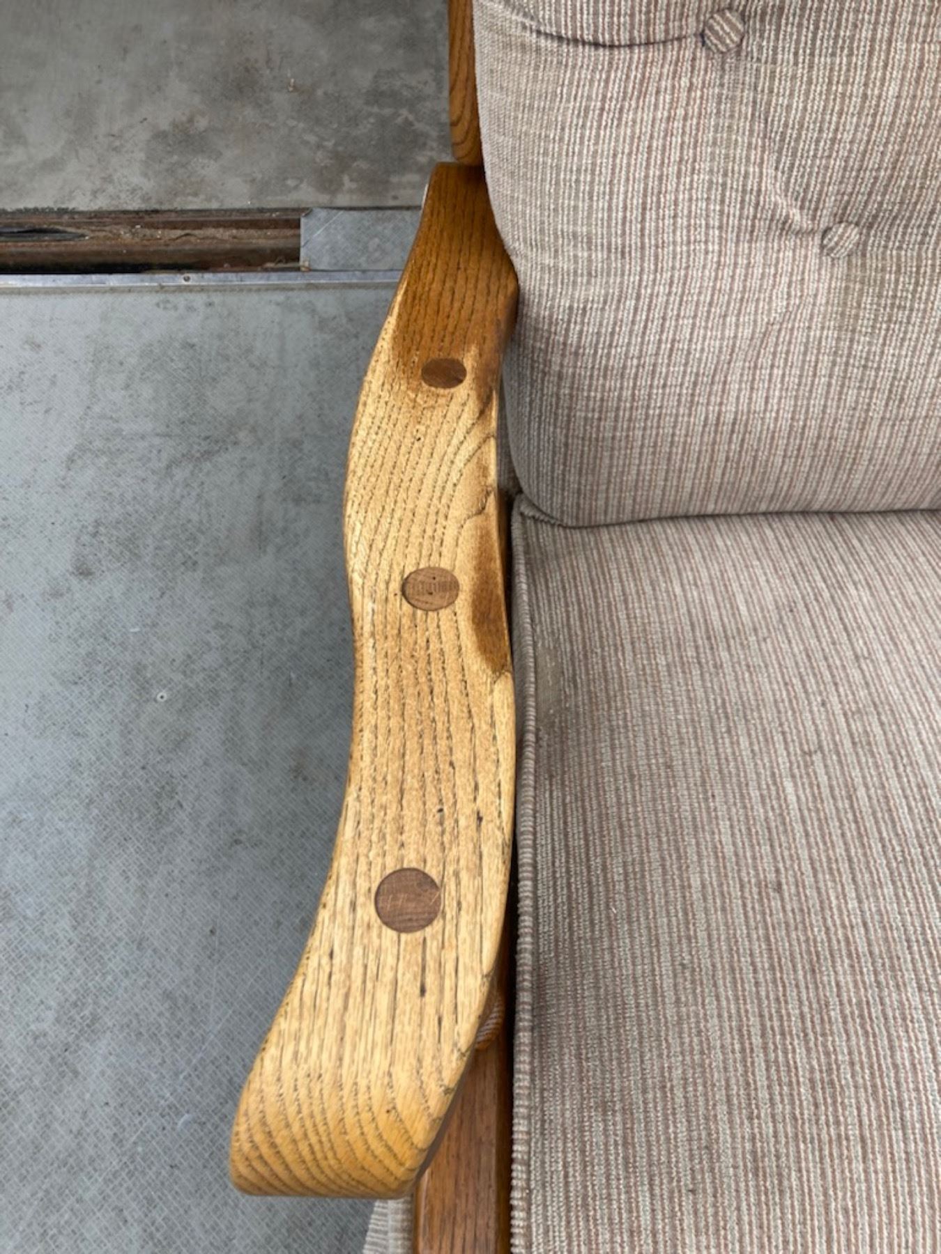 VINTAGE PLATFORM ROCKER WITH WOODEN ARMS