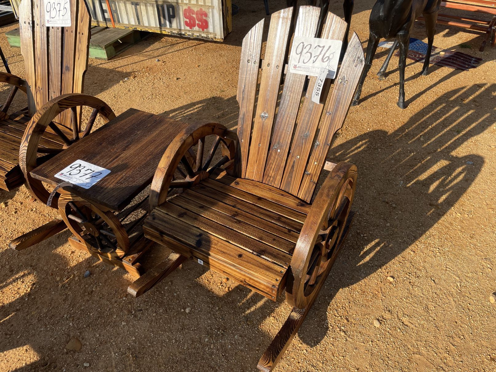 WAGON WHEEL ROCKING CHAIR - J.M. Wood Auction Company, Inc.