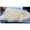 Image 2 : SHEEPSKIN RUG AND 2FT STATUE