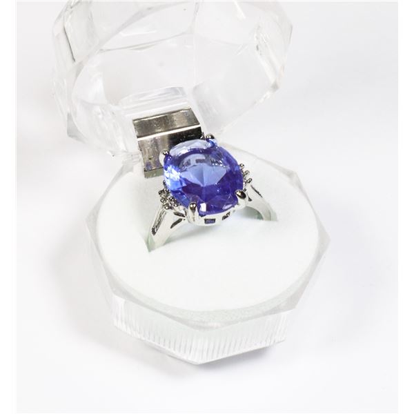 LADIES OVAL BLUE ZIRCON COLORED STONE RING