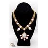 21" GOLD TONE WOVEN CHAIN NECKLACE FEATURING