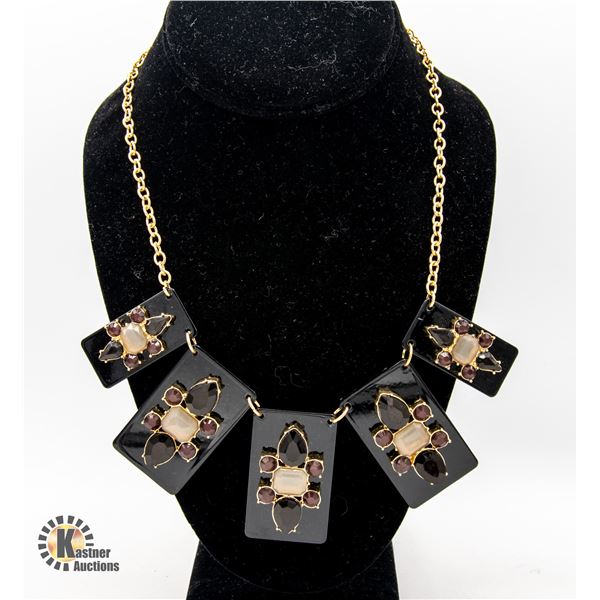 19  GOLD TONE NECKLACE W/ BLACK ACRYLIC