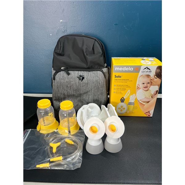 Lot of 1 Medela Solo Single Electric Breast Pump & Medela Accessory Kit