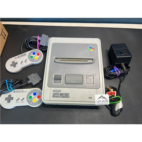 Lot of 1 Super Nintendo Entertainment System (SNES) w/ Cord & 2 Controllers