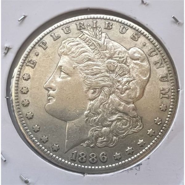 1886-S MORGAN DOLLAR SUPERIOR WHITE BU KEY DATE