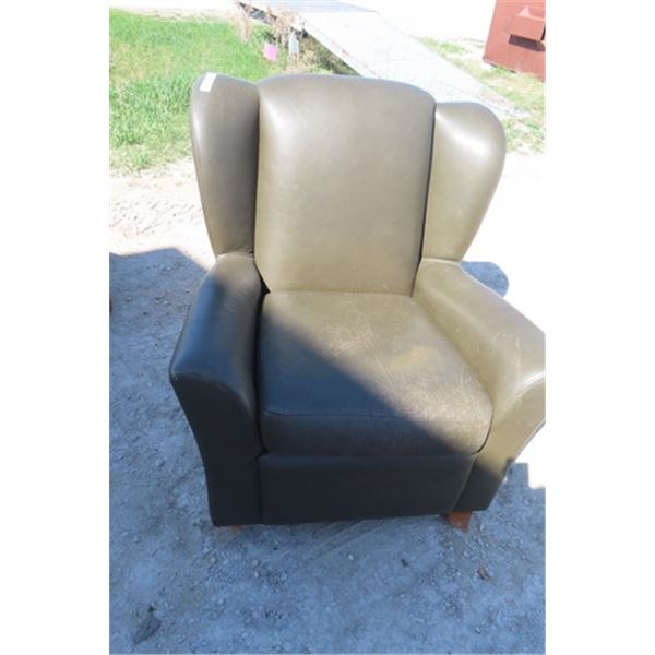 Leather Style Living Room Chair showing some wear