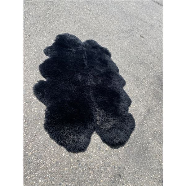 Faux bear skin rug