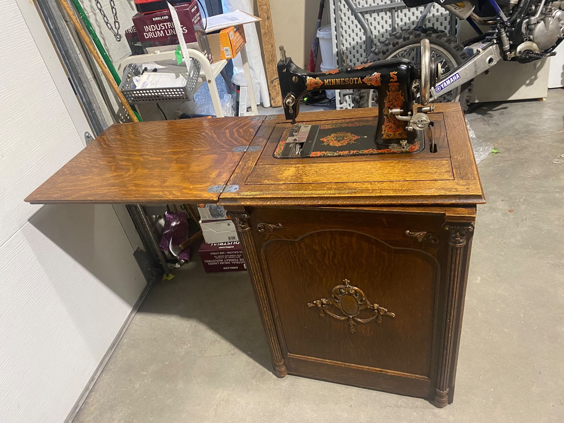 Minnesota Sewing Machine in Oak Cabinet