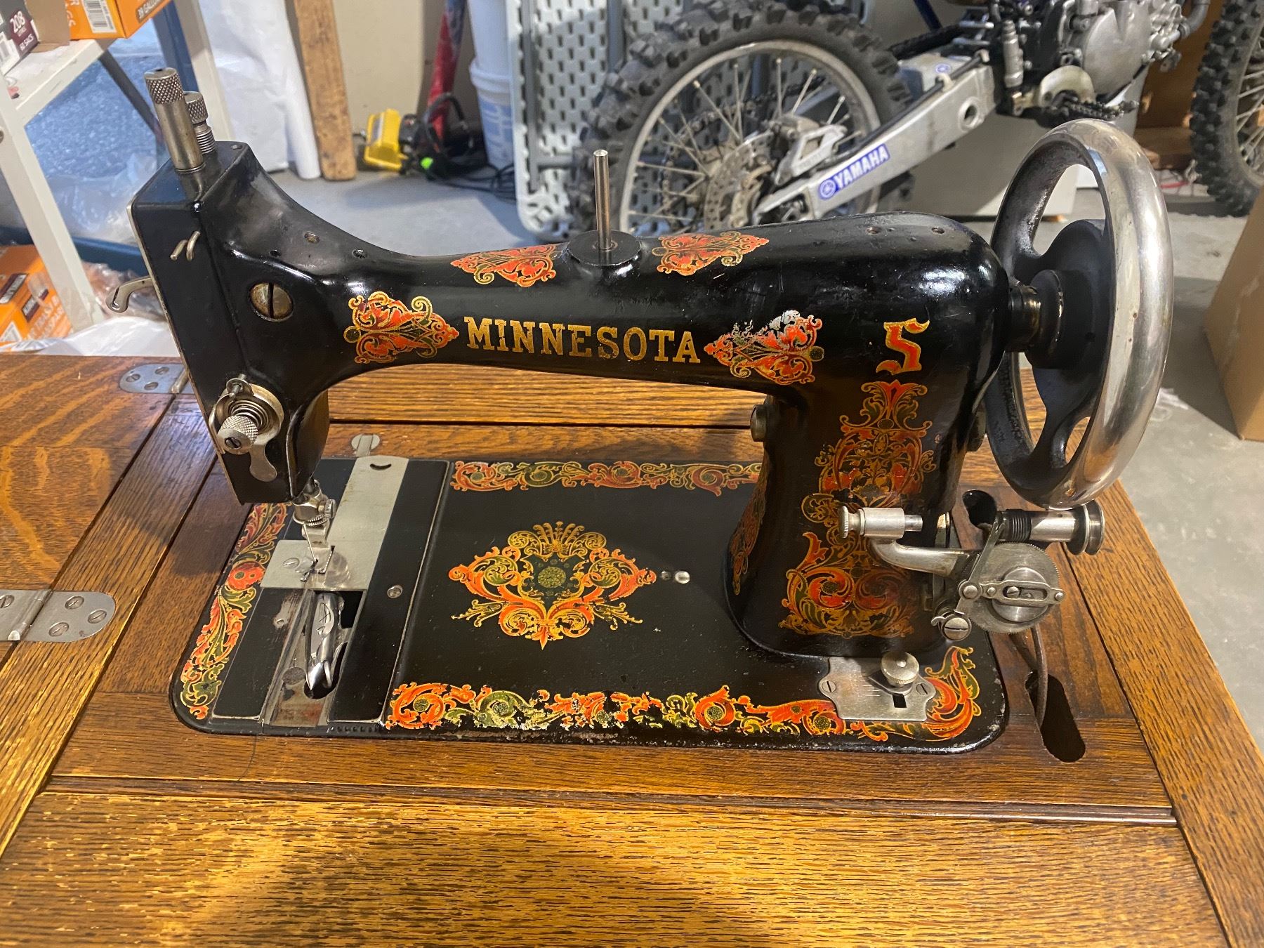 Minnesota Sewing Machine in Oak Cabinet