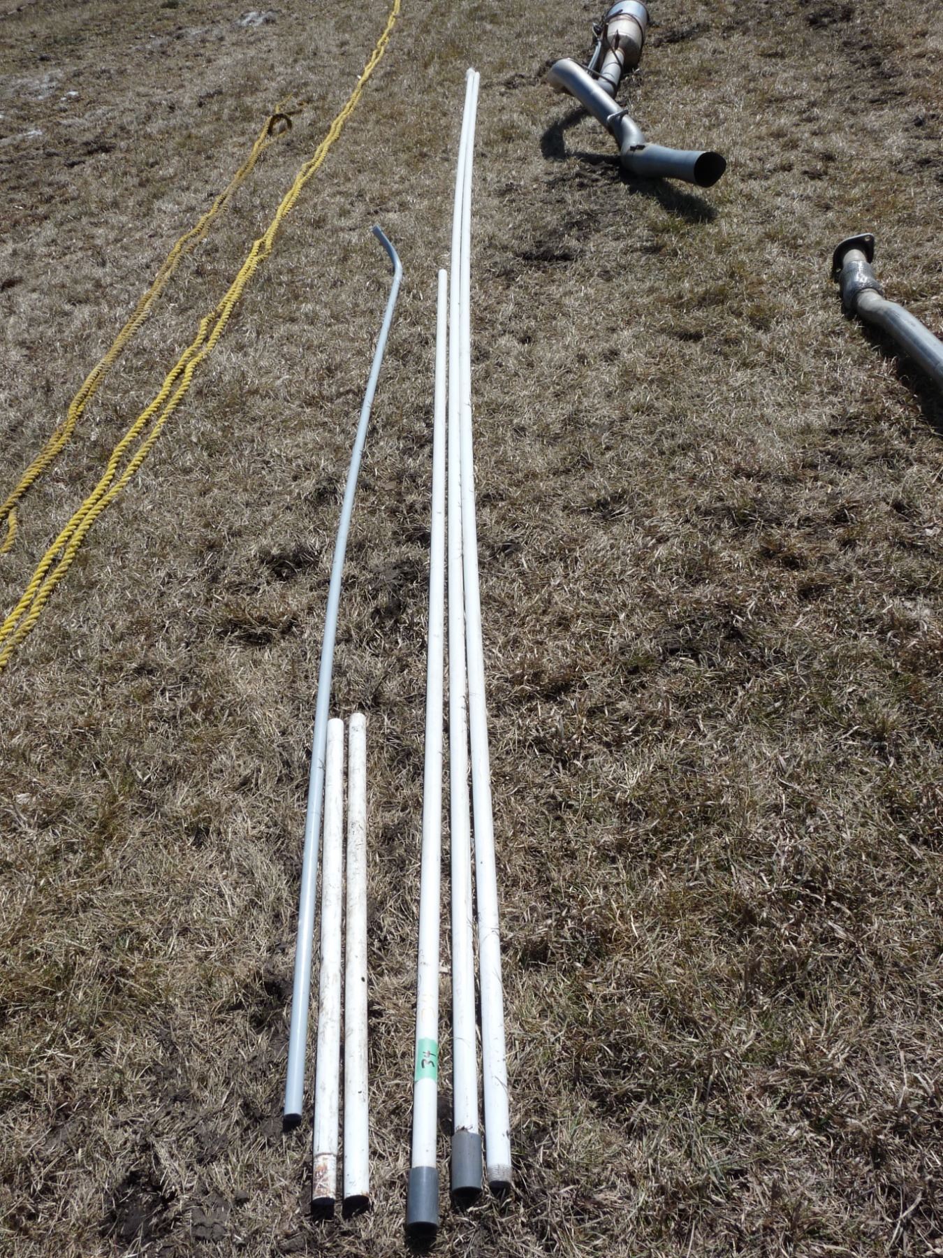 Two lengths of approximately 18 foot vertical well pipe plus extra lengths