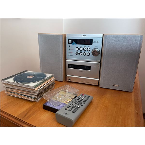 RMZ20020 Stereo CD Player with Remote & Assortment of CD's