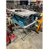 Image 1 : MAKITA 2705 10" PORTABLE 120V ELECTRIC BENCHTOP TABLE SAW ON MAKITA MOBILE FOLDING TABLE SAW STAND