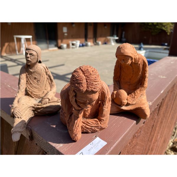 Three Clay Garden Statues