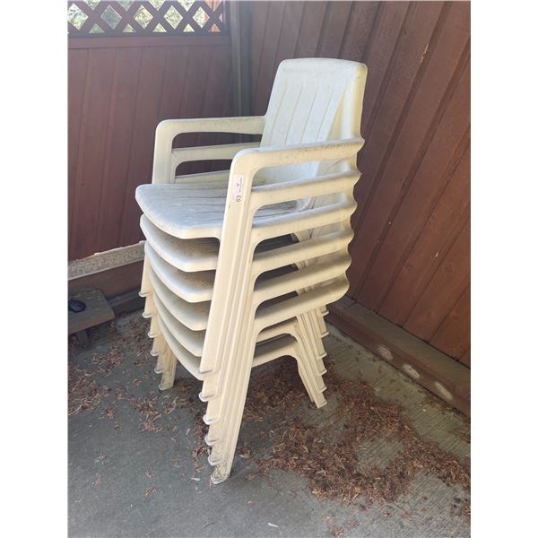Six Plastic Patio Chairs