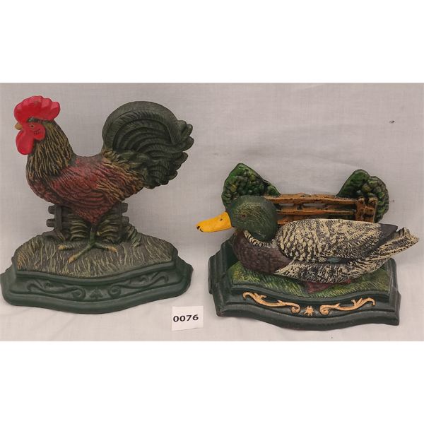 LOT OF 2 - BIRD CAST IRON DOOR STOPS