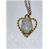 Image 2 : 10K GOLD CHAIN AND PENDANT WITH A SOLID CRYSTAL OPAL