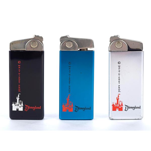 A Trio of Esprit 2000 Souvenir Lighters.