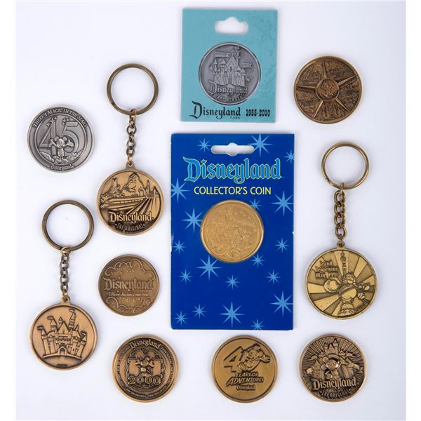 A Collection of Disneyland Coins and Keychains.