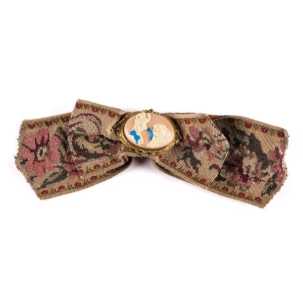 A Tony's Town Square Restaurant Lady & Tramp Bow.