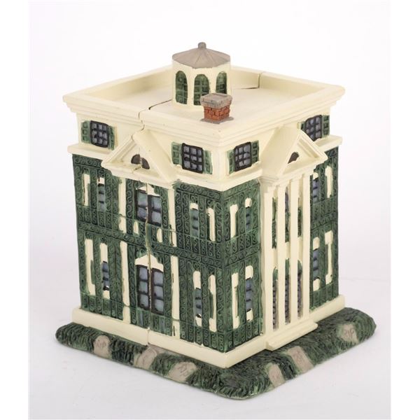 A Disneyland Haunted Mansion Figural Box.