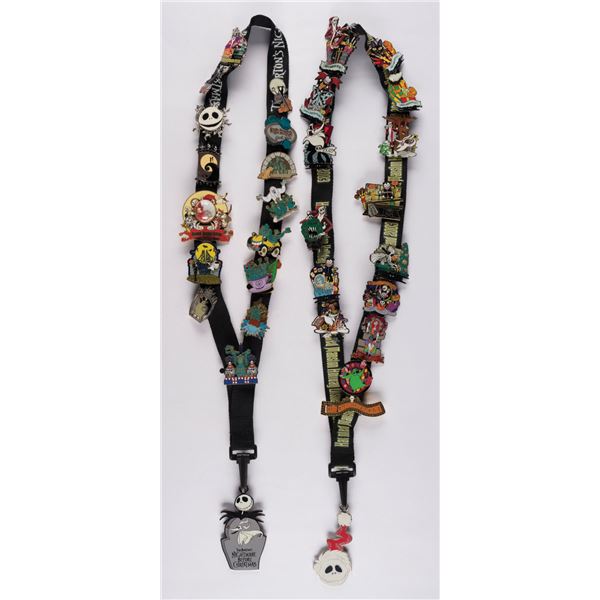 A Pair of Haunted Mansion Lanyards & 30 Pins.