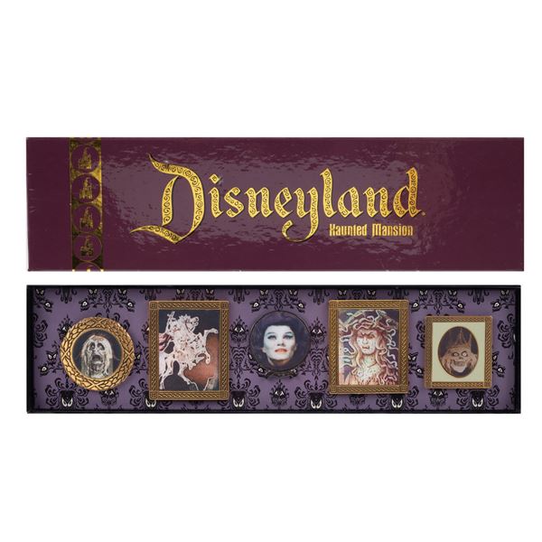 A Haunted Mansion 50th Anniversary Lenticular Pin Set.