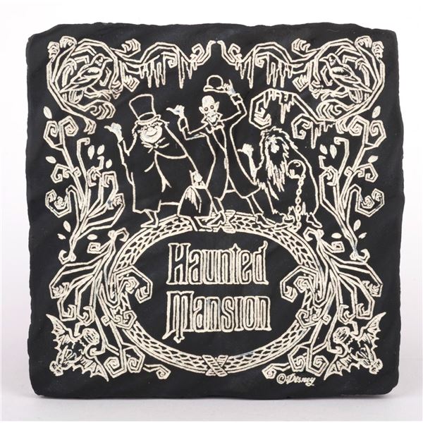 A Disney Home Chalkboard Haunted Mansion Coaster Tile.